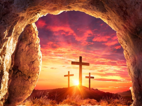 Empty tomb with three crosses at sunrise symbolizing Jesus’ resurrection and Good Friday sacrifice