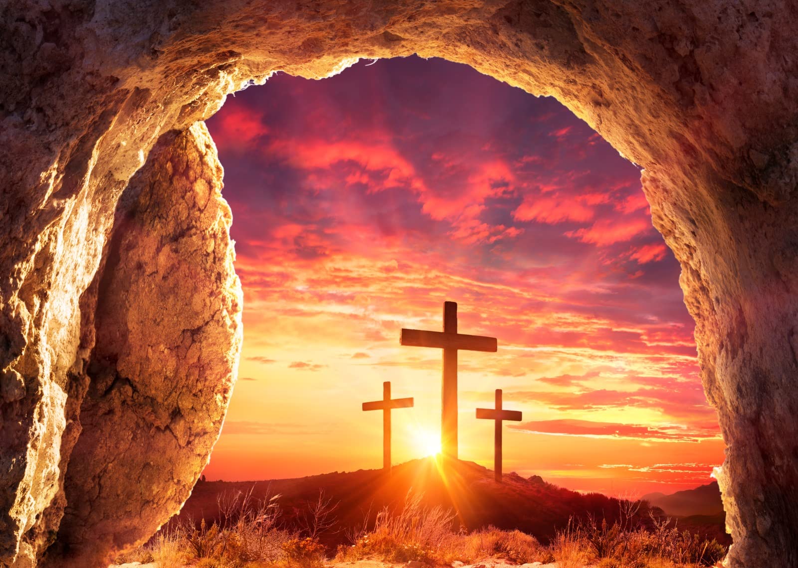 Empty tomb with three crosses at sunrise symbolizing Jesus’ resurrection and Good Friday sacrifice